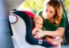 Was Sie über Isofix und den neuen i-Size Standard wissen sollten Mutter befestigt Kindersitz im Auto