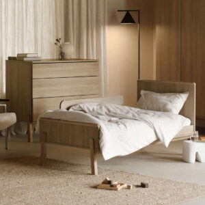 Zum Juniorbett umgebautes Kinderbett